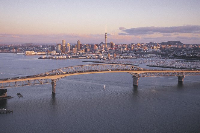 5-Day New Zealand North and South Island Highlights Tour - Setting the Route: Auckland to Christchurch by coach, ferry, and rail