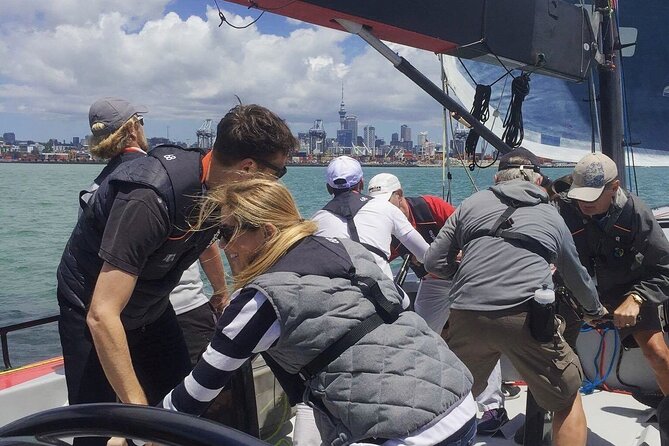 America's Cup Sailing on Auckland's Waitemata Harbour - Choosing your role, from grinders and helm time to relaxed skyline watching