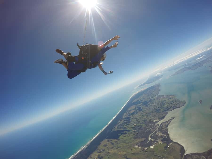 Auckland: 13000, 16000, or 18000-Foot Tandem Skydive - Parachute calm: serenity after the rush