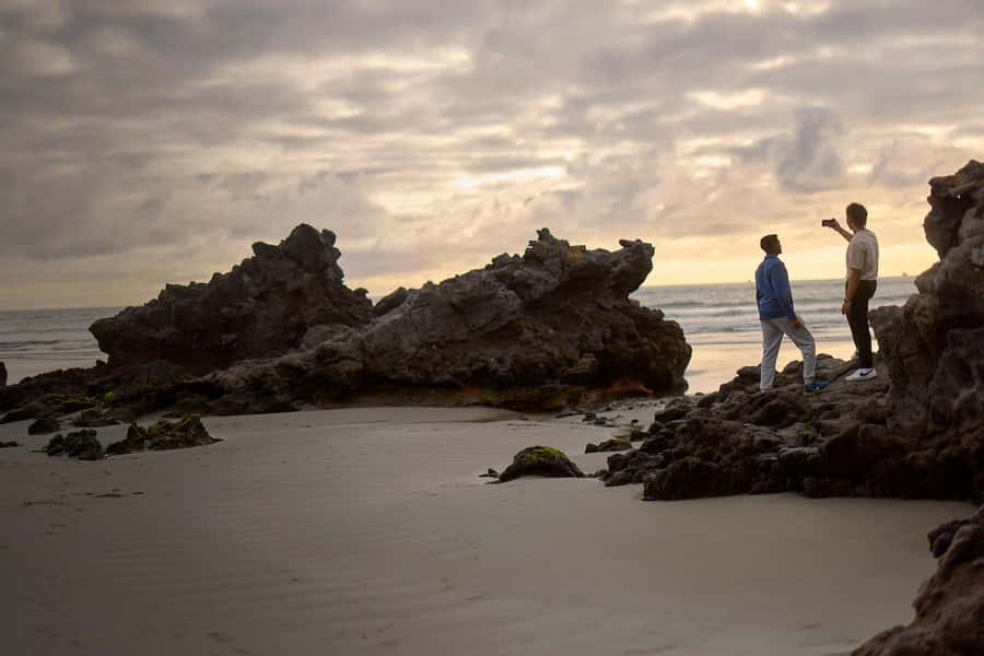 Christchurch: Guided Crater Rim Walk with Picnic - Historical stops: WWII gun emplacements, an Antarctic cabin, and penguins