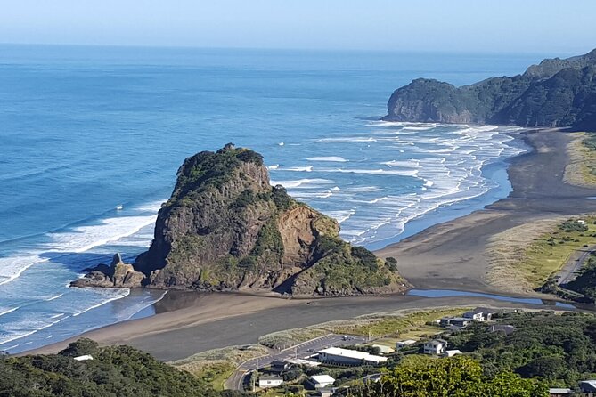 Explore BLACK SAND PIHA BEACH, and Water Falls in West Auckland - Kitekite Falls walk: stairs, fern-lined track, and a natural pool