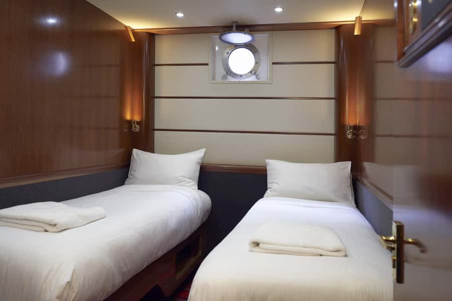 From Manapouri: Doubtful Sound Overnight Cruise - Packing list that matches the real Doubtful Sound: layers, rain, and dry backup