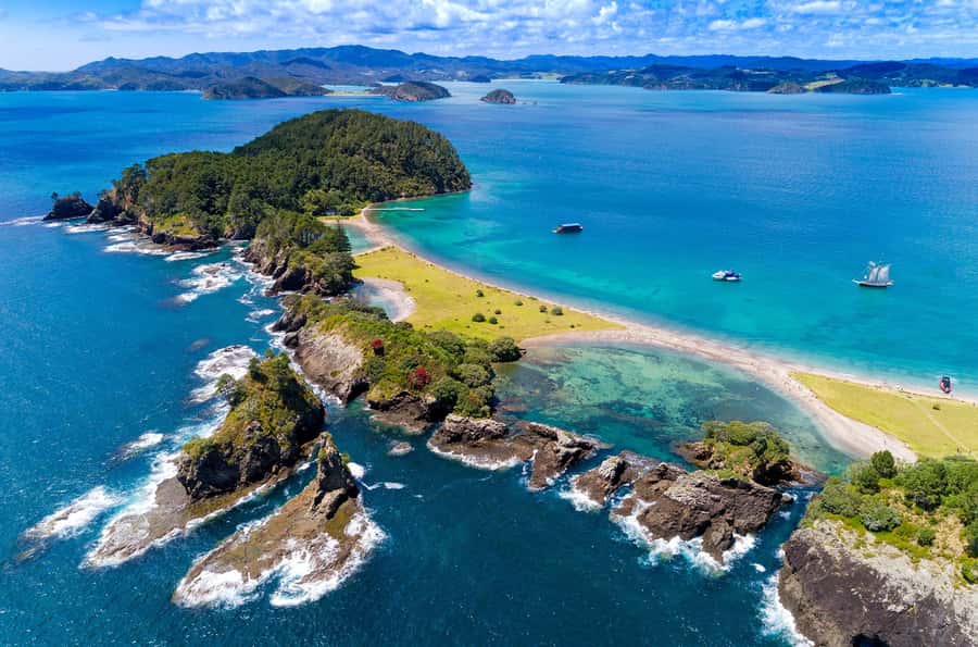 From Paihia: Full-Day Bay of Islands Cruise - Cruising past 144 islands toward Cape Brett and the Black Rocks