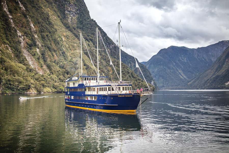 From Queenstown: Doubtful Sound Wilderness Day Trip - Wilmot Pass coach time: rainforest riding with real payoff