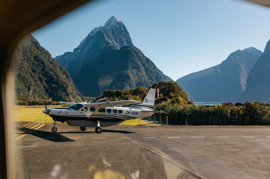 From Queenstown: Milford Sound Flight and Nature Cruise - Milford Sound by small boat: Stirling Falls, steep cliffs, and close wildlife time