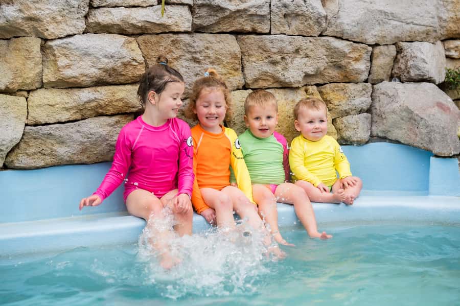 Geothermal and Freshwater Combo Family Pools in New Zealand - The heated 33°C freshwater pool and mini hydro slide
