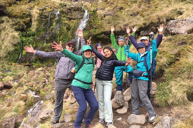 Half Day Tongariro Alpine Guided Group Walk - Stop 1 at Adrift Tongariro Base: Check-In, Waivers, and Conditions