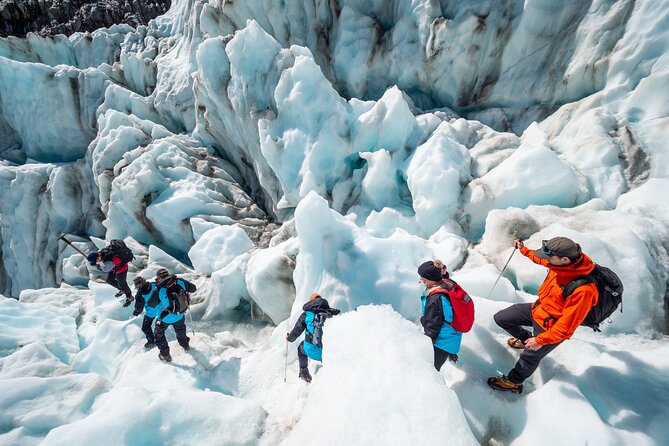 Heli Hike Fox Glacier - On-ice hiking: following the guide’s cut steps on shifting terrain