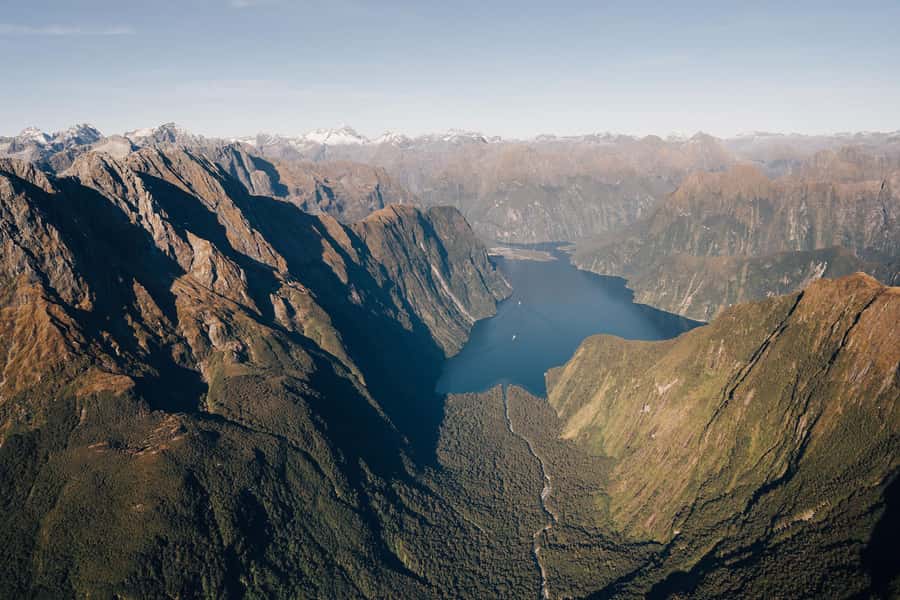 Milford Sound: 1.5-Hour Helicopter Tour with Two Landings - The flight from Queenstown into Fiordland, where the scale hits you