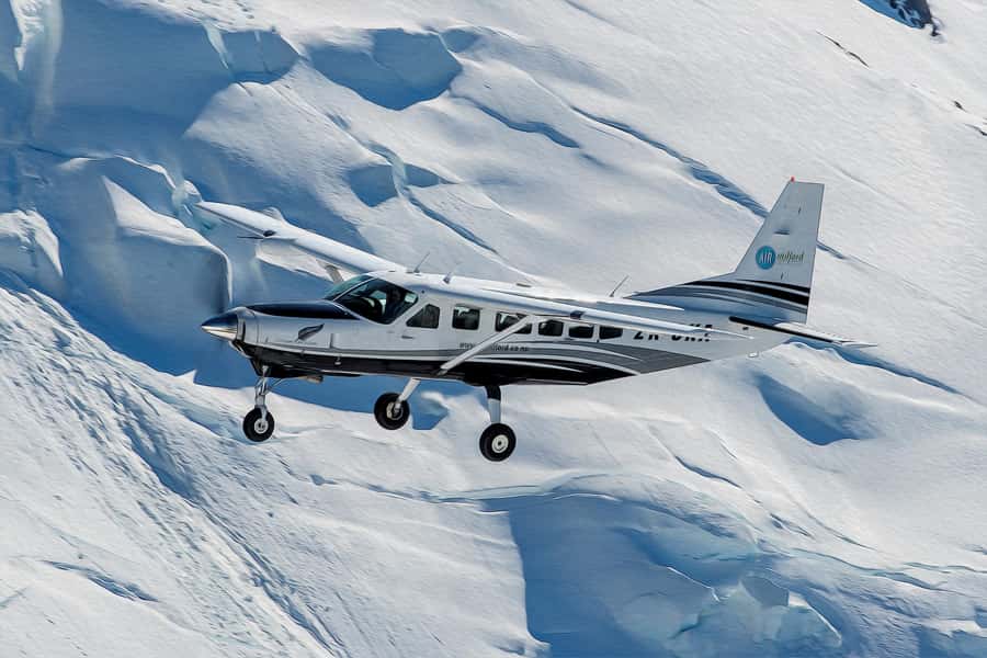 Milford Sound & Big 5 Glaciers Scenic Flight from Queenstown - Inside the 12-Seater Cessna: Views, Comfort, and Listening