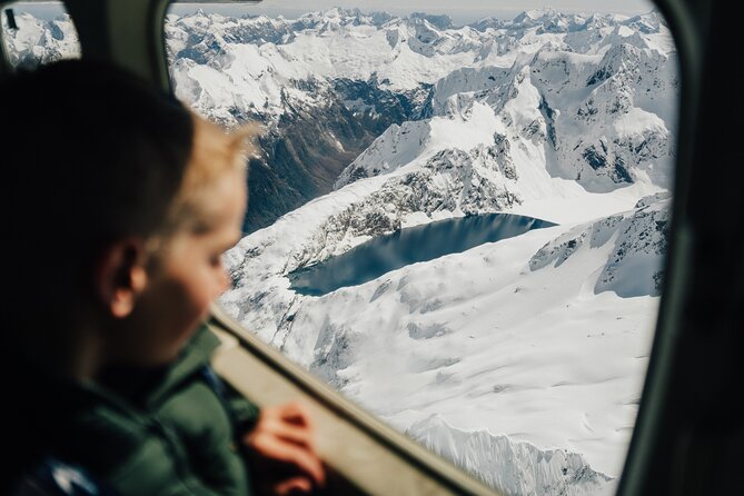 Milford Sound Coach, Cruise and Flight Sightseeing Tour from Queenstown - Reaching Milford Sound: Where the Day Shifts from Road to Water