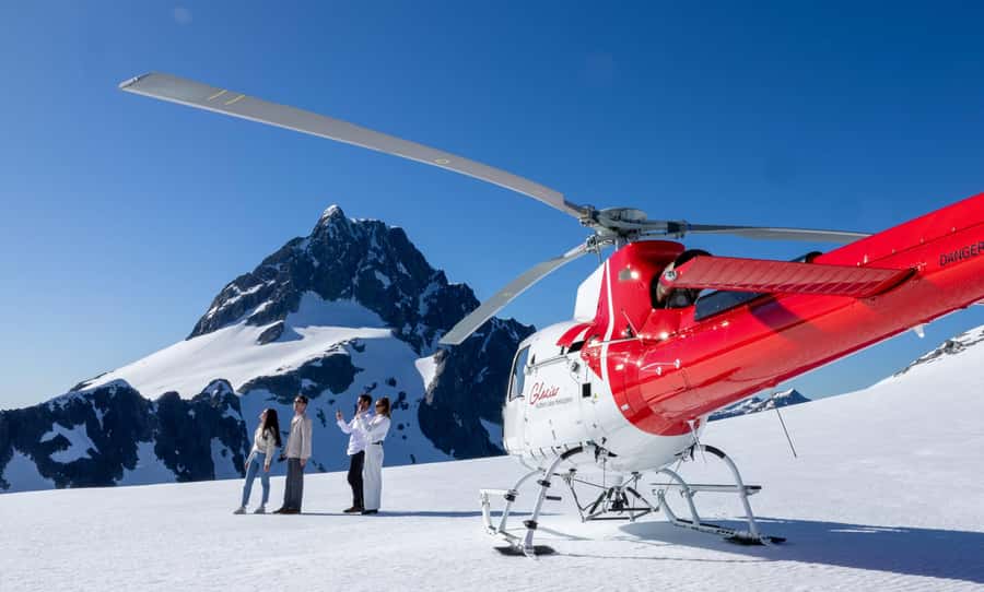 Milford Sound Extended Helicopter Flight & 3 Landings - Flying the full 16 km of Milford Sound, waterfalls and sheer cliffs from above