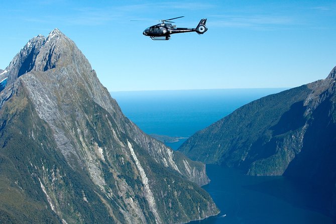 Milford Sound Helicopter Flight and Cruise from Queenstown - Cruise time on Milford Sound: waterfalls, rainforest slopes, Mitre Peak