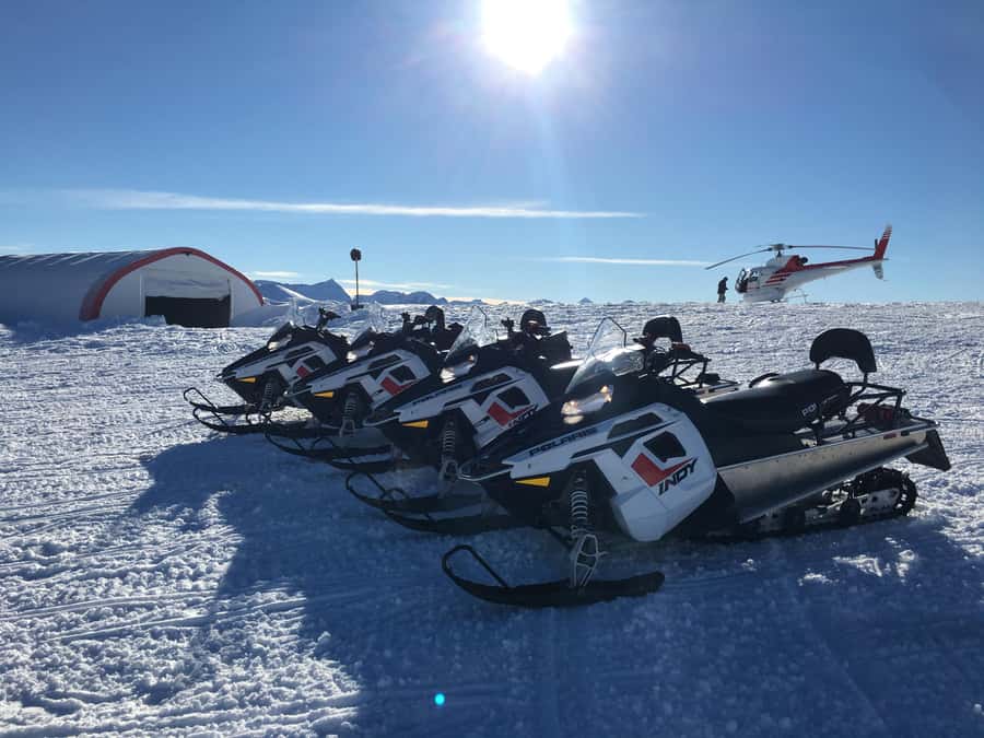 Queenstown: Snowmobiling Experience with Helicopter Flight - Hotel pickup and courtesy coach transfers: less hassle, more doing