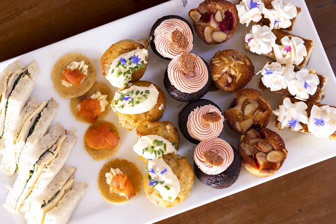 Queenstown: Walter Peak Farm Tour and Lake Cruise - Old Woolshed Tea: Scones, Cakes, and a Proper Break