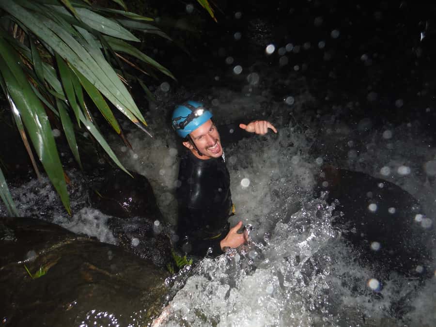 Raglan: Sunset Canyoning Tour and Glowworm Experience - Getting started at Raglan Rock, van ride, and a safety briefing that sets you up