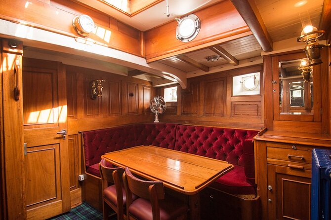Scenic Cruise & Guided Walk on Historic Motor Yacht Lake Te Anau - Boarding the historic yacht: why the boat itself becomes part of the story