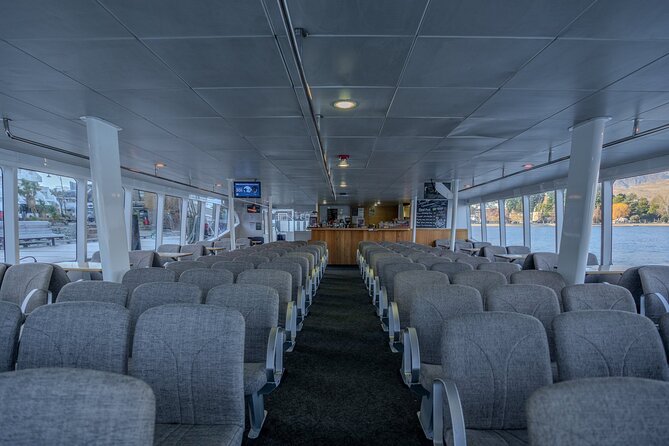 Scenic Queenstown Lake Cruise - Onboard comfort: café, bar, big windows, and smooth sailing
