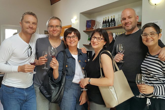 Self Guided Martinborough Wineries Bike Tour - Stop 2: Te Kairanga Wines for gin, wine, and park-like calm
