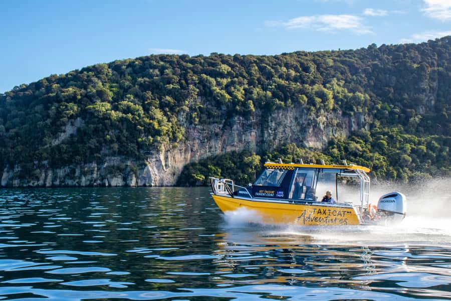 Taupo: Lake Taupo Western Bays Catamaran Tour with Bush Walk - The catamaran run: throttle, bow views, and Otupotu Falls