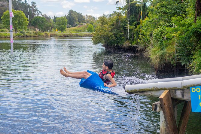 Tauranga: Waimarino Adventure Park - The main splash zone: water trampoline, slides, and floating obstacles