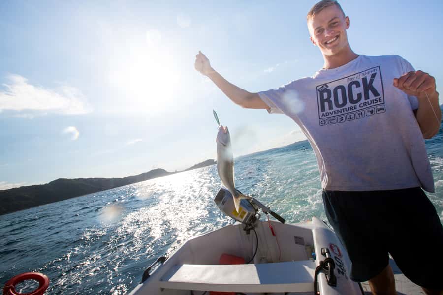 The Rock Adventure Day Cruise - Kayaking along the shoreline and caves you can reach by water