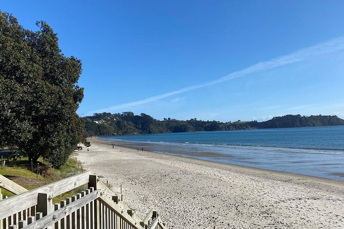 Waiheke Island Half Day Scenic Wine and Lunch - Onetangi Beach: 15 minutes for photos and pohutukawa shade