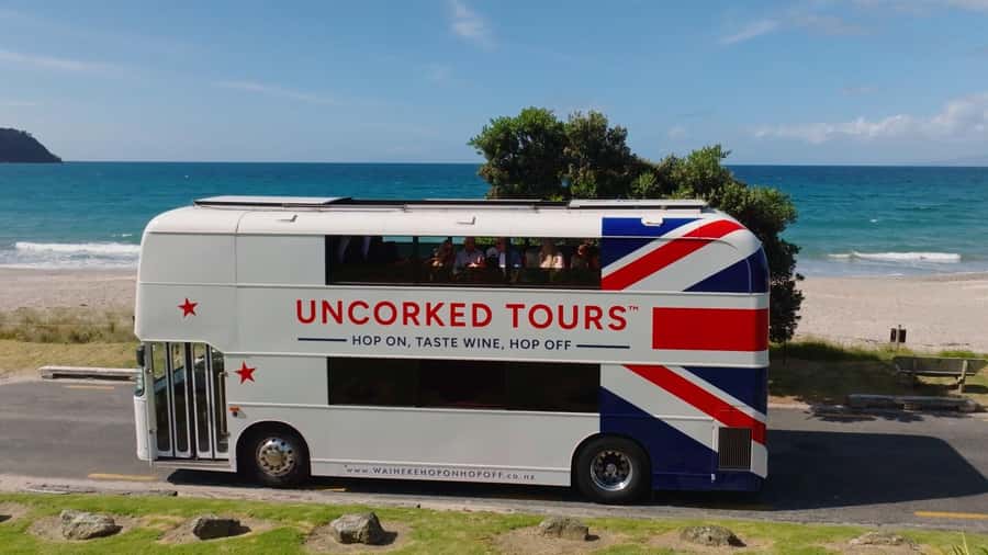 Waiheke Island: Scenic Island Wine Tour & Local Wine Tasting - What the winery stops feel like, from tastings to charcuterie