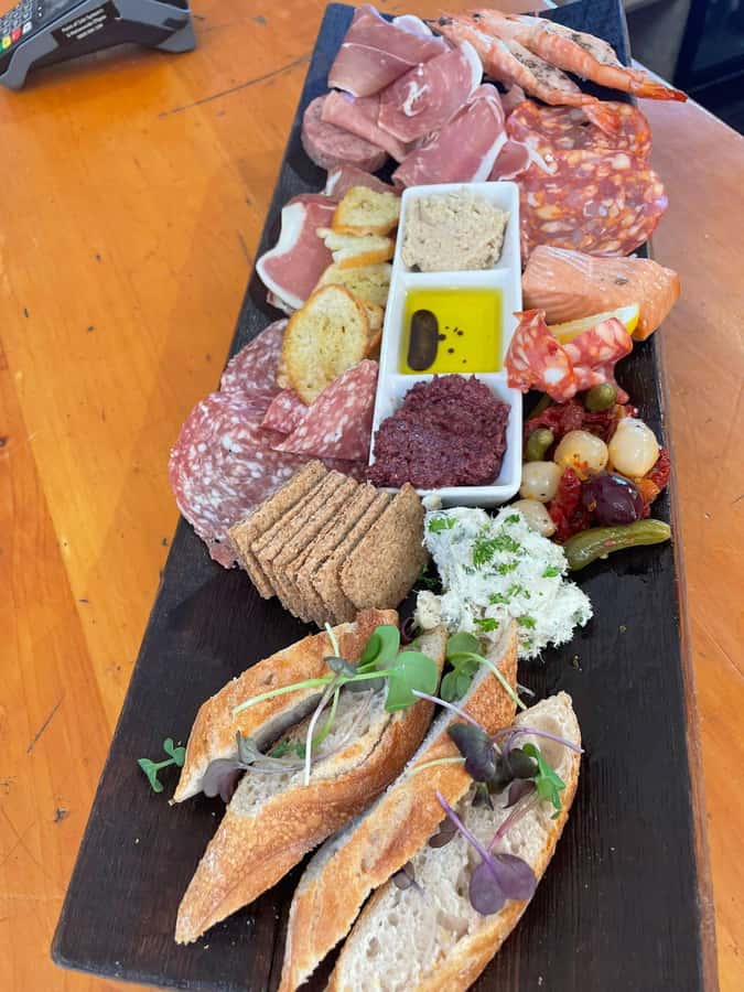 Waiheke: Scenic Taste and Graze Tour with Wine, Whisky, Beer - From Matiatia to Mudbrick: wine tasting with Rangitoto views