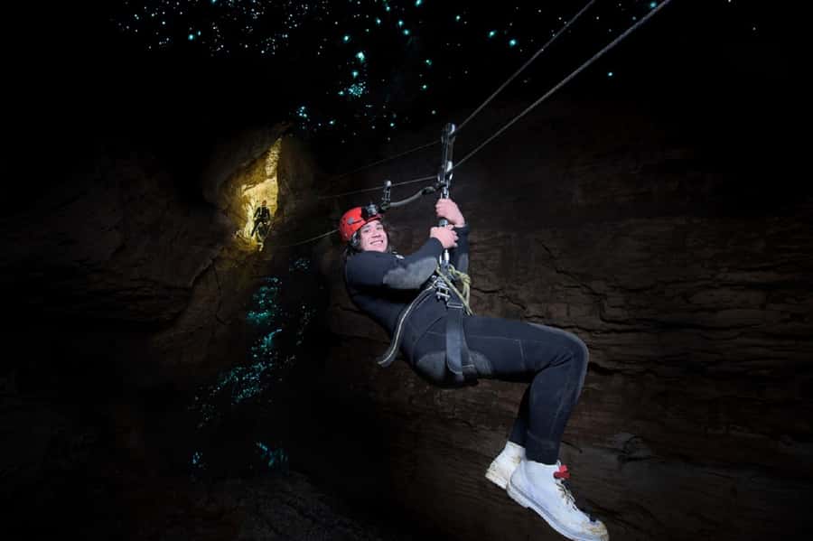 Waitomo Caves Black Abyss Ultimate Caving Experience - Waterfalls underground: climbing where most people only imagine